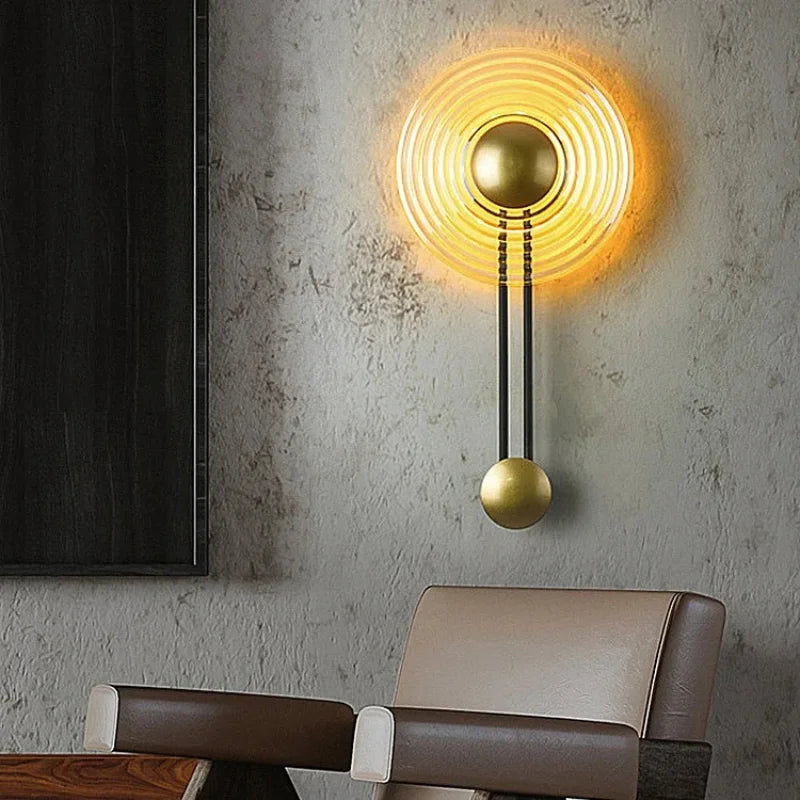 Modern-sensor-wall-light-with-golden-circular-design
