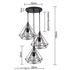 Three-black-diamond-shaped-hanging-lights-suspended-over-a-dining-table